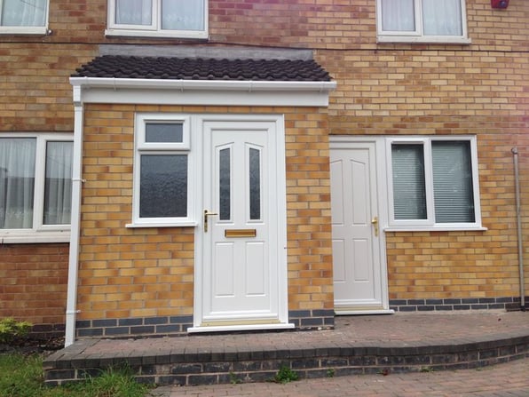 A close up of a house that has had a new door to help improve their home insulation this winter.