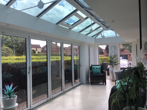 A large orangery which has added timeless elegance to a house.