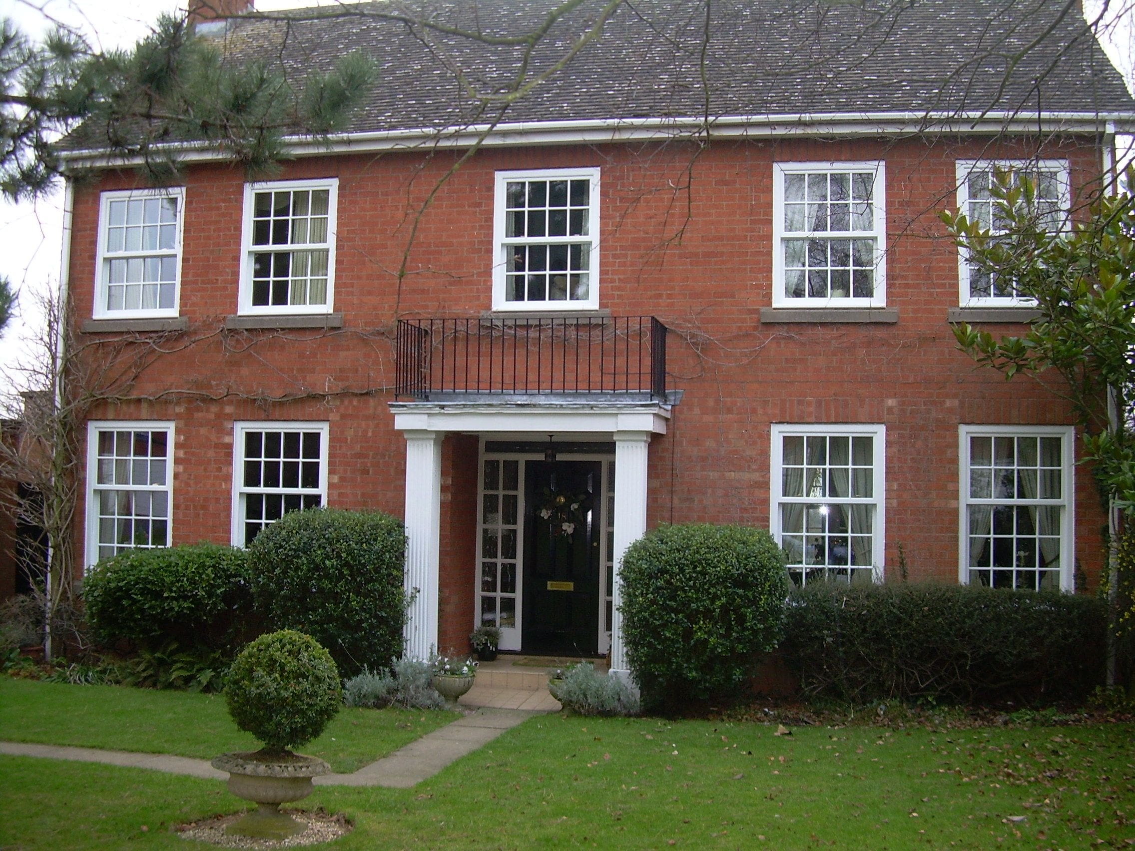 A house with vertical slider windows installed showing the benefits of them. 